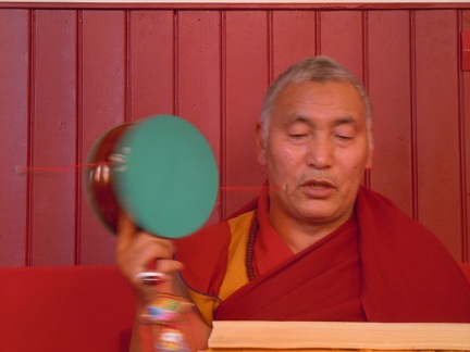 Lama Sangye 
    Monlam playing Damaru